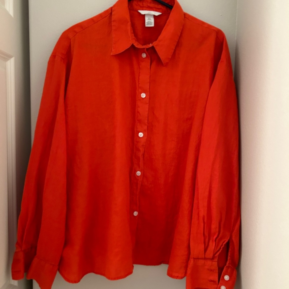 H and M women’s xl linen blouse. A pretty orangey red. Long sleeved.